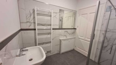 **Exclusives modernes 3-Zimmer-Appartment mit Balkon - Hochparterre**