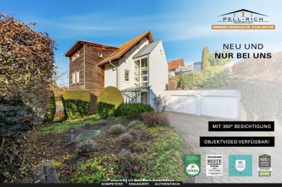 WOHNEN MIT WEITBLICK: Attraktives Architektenhaus für zwei Familien in schöner Höhenlage