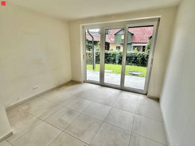 Helle Gartenwohnung mit TG-Parkplatz!