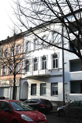 Charmante Eigentumswohnung im 1. Obergeschoss mit Balkon und Dachterrasse in Stadtlage