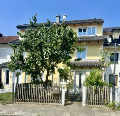 Familienfreundliches Reihenhaus mit Einliegerwohnung und idyllischem Westgarten in Milbertshofen