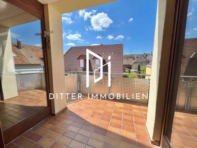 Dachgeschosswohnung mit Süd-Balkon/Loggia, Einbauküche und Tiefgaragenstellplatz in der Innenstadt