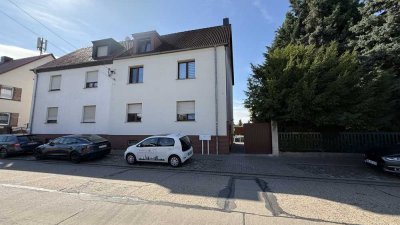 Drei-Familienhaus mit liebevoll gepflegten Garten