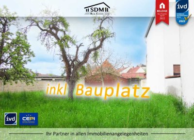 POTENTIAL: Zweifamilienhaus mit Baugrundstück in Oberhausen