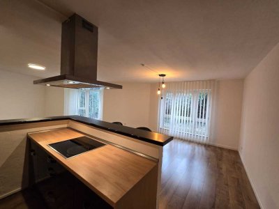 Licht. Ruhe. Eleganz. Exklusive 2-3 Zimmer-Wohnung mit Terrasse und TG in Düsseldorf-Ludenberg