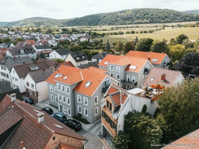Moderne 3-Zi.-EG-Wohnung mit Terrasse & Gartenanteil – Wohnen am Weinsteig in Deidesheim