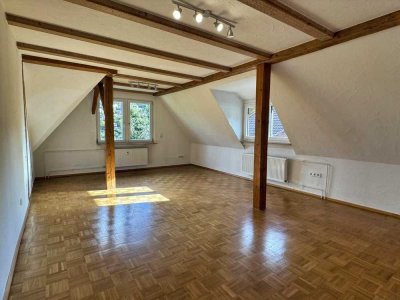 Großzügige 2,5-Zimmer-Dachgeschosswohnung mit Neckarblick und eigenem Gartenanteil