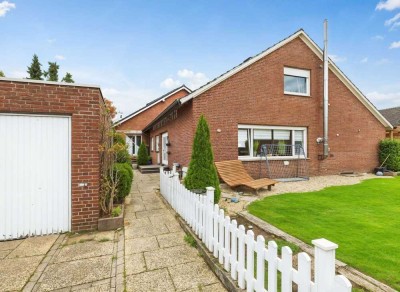 Gemütliches Zweifamilienhaus mit Garage und Garten in ruhiger Lage - Ihr Traum vom Wohnen im Grünen!