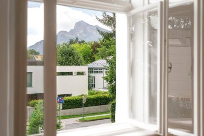 Lichtdurchflutetes Wohnen in einer Ceconi-Villa – 2,5 Zimmer Altbauwohnung mit Garten und Bergblick
