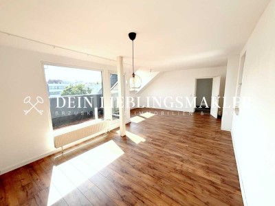 ÜBER DEN DÄCHERN DES GRÜNDERZEITVIERTELS VON MG - ATTRAKTIVE ETW MIT BALKON UND GARAGE