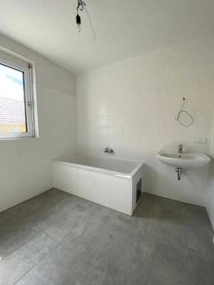 PROVISIONSFREI - Helle Erstbezugswohnung mit guter Raumaufteilung, Balkon in ruhiger Lage - geförderte Miete - 3 Zimmer