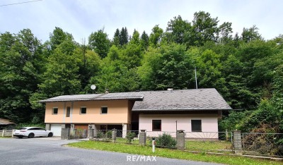 Attraktives Immobilienangebot in Bad Eisenkappel: Zwei sanierungsbedürftige Häuser mit Garten, Garagen und viel Potenzial