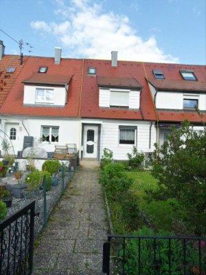 Reihenhaus mit grünem Rückzugsort