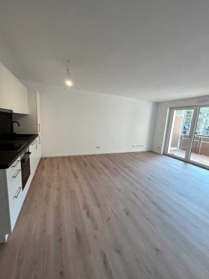 Erstbezug | Neubau: 3-Zimmer-Wohnung mit Balkon | EBK | TG | Fußbodenheizung