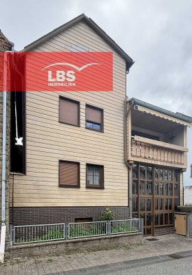 Freistehendes Einfamilienhaus mit Garten und Garage in Hünfelden-Mensfelden