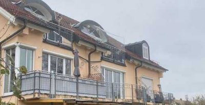 Charmante 1-Zimmer-Wohnung mit Ostbalkon und Tiefgarage in ruhiger Lage von Laufen.