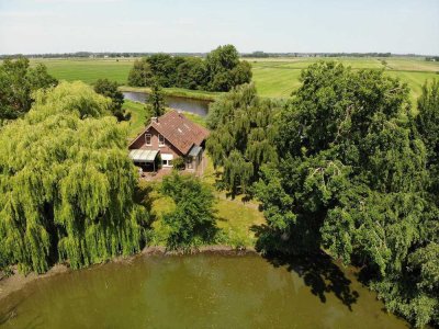 Einmalige Immobilie in exklusiver Lage direkt am Ems-Jade-Kanal