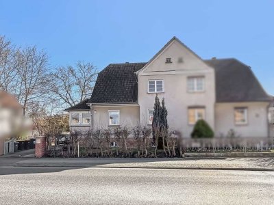 Charmante Doppelhaushälfte mit großem Grundstück und vielseitigen Möglichkeiten in Falkensee