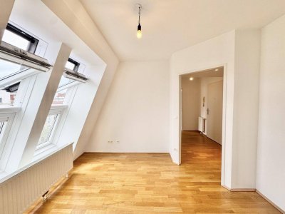 Nähe U1 | 2 Zimmer Dachgeschosswohnung mit Gemeinschaftsdachterrasse