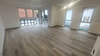 Erstbezug! Raumgefühl auf 68m² im 1. OG mit bodentiefen Fenstern, Stellplatz auf Wunsch