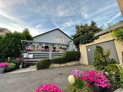 Modernisierte 4-Zi EG Wohnung mit Terrasse und Garage