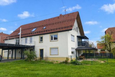 Großzügiges Wohnhaus mit Einliegerwohnung, 64 m² Dachterrasse & 1.200 m² Grundstück in ruhiger Lage