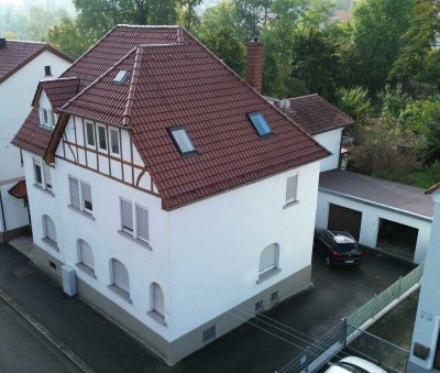 Charmantes 5-Familienhaus mit großem Garten und zwei Garagen in begehrter Lage von Neckargartach