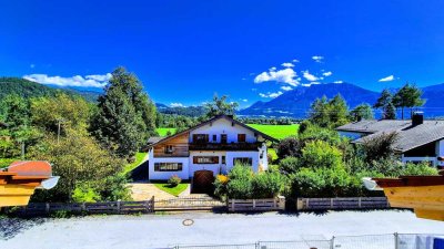 Neubau-Erstbezug: Luxuriöses Penthouse, riesige Gauben, exklusiver Balkon & traumhafter Kaiserblick