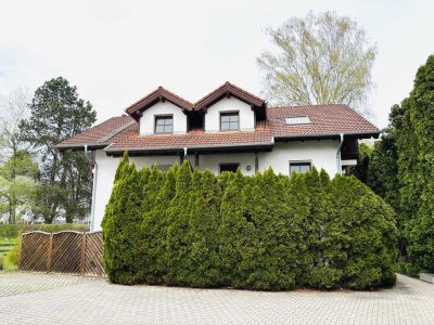 Charmante 2 Zimmer EG Wohnung mit Gartenanteil und Terrasse in Süd / West Lage.