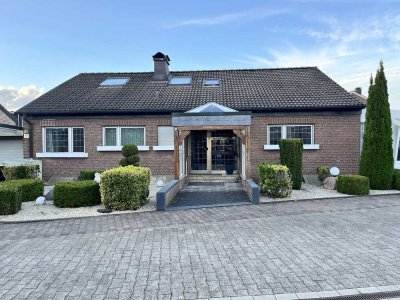 Wohnen mit Weitblick: Einfamilienhaus mit separater Einheit für die nächste Generation