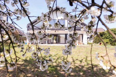 Erstbezug nach hochwertiger Sanierung – stilvolles Einfamilienhaus mit großzügigem Garten und Garage