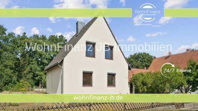 Charmantes Siedlungshaus mit großem Garten am Waldrand, Keller und Anbaupotenzial in Kralenriede