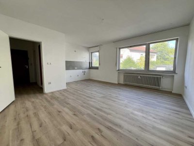 Moderne 1-Zimmer-Hochparterrewohnung mit neuer Küche und Top-Lage