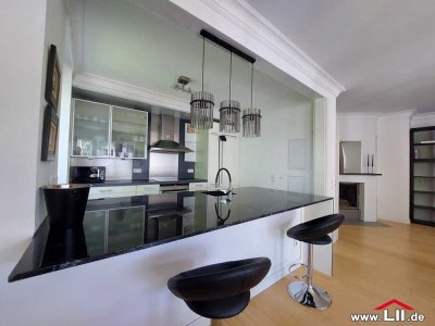 Modern möblierte 2 ZW mit Kamin, Südbalkon und TG-Stellplatz