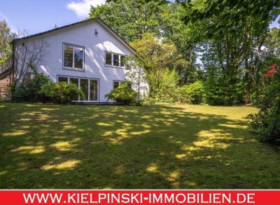 Ein Haus, zwei Chancen: Großzügiges EFH mit parkähnlichem Garten & abtrennbarem Baugrundstück