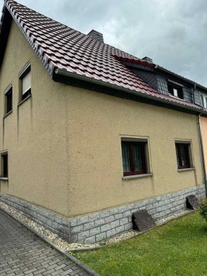 Einfamilienhaus mit viel Ausbaureserve in einer Einfamilienhaus-Siedlung