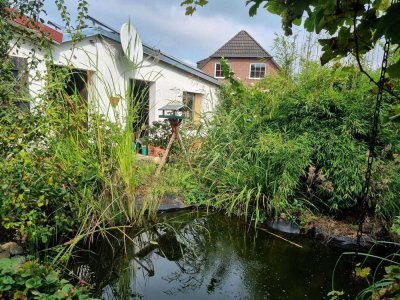 Ein- bis Zweifamilienhaus im Grünen mit viel Potenzial