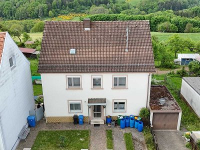 Ein-Zweiparteienhaus mit Potential