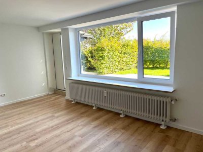 Moderne Singlewohnung mit Terrasse, Garten und Stellplatz - Erstbezug nach Sanierung