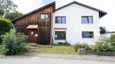 Großzügige, architektonisch interessante Doppelhaushälfte mit Einliegerwohnung