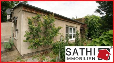 Handwerker aufgepasst! Ebenerdiges Einfamilienhaus mit Sanierungsbedarf auf teilbarem Baugrundstück!