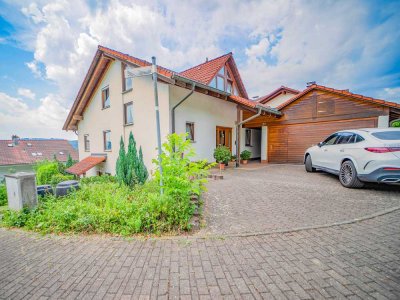 Familienidylle mit Einliegerwohnung – Wohnkomfort in ruhiger Hanglage
