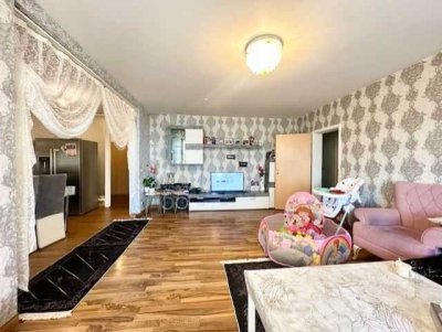 8,8% Nettorendite: 4-Zimmer-Wohnung mit Gäste-WC & TG in gepflegter Wohnanlage