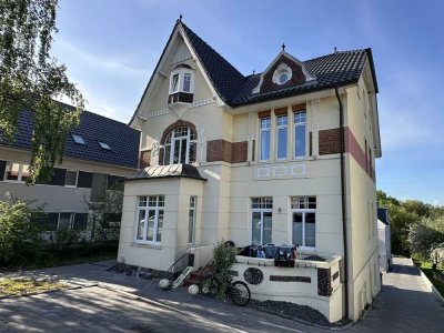 Wohnung mit Kaminofen und Terrasse im Souterrain einer sanierten Stadtvilla