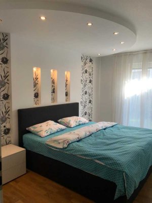 Neubau, teil- möbliert 2-Zimmer-Erdgeschosswg mit Garten und EBK