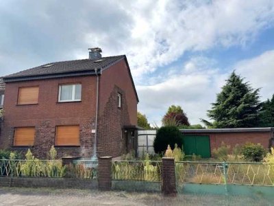 Solides Wohnhaus mit Garten und Garage in Süd- Westlage