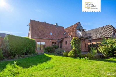 Syke - Gessel | Zweifamilienhaus mit Gartenparadies