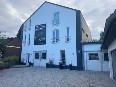 Modernes Wohn- & Geschäftshaus mit PV, Sauna & großem Garten