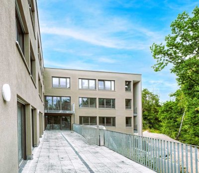 NEU 2-Zimmer-Appartement mit tollem Blick, Einbauküche, TG Platz sowie Strom +Internet inklusive!