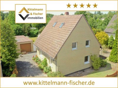 Einfamilienhaus mit Doppelgarage und großem Grundstück – ruhige Lage direkt am Mittellandkanal